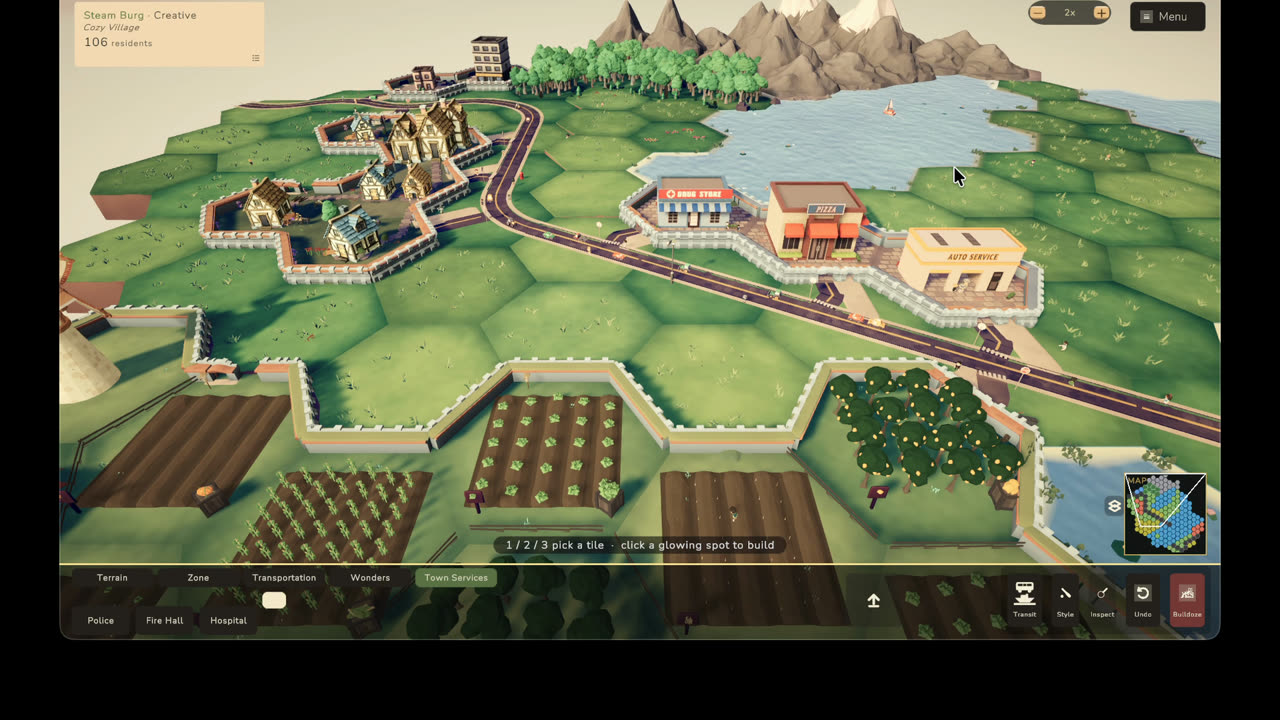 Coastal farmland with silos and fields running down to the sea